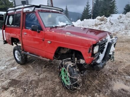 Червоний Ніссан Патрол, об'ємом двигуна 0.33 л та пробігом 300 тис. км за 5650 $, фото 1 на Automoto.ua