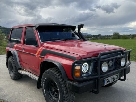 Красный Ниссан Патрол, объемом двигателя 2.8 л и пробегом 250 тыс. км за 6500 $, фото 1 на Automoto.ua