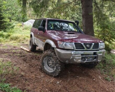 Красный Ниссан Патрол, объемом двигателя 0 л и пробегом 290 тыс. км за 9300 $, фото 1 на Automoto.ua