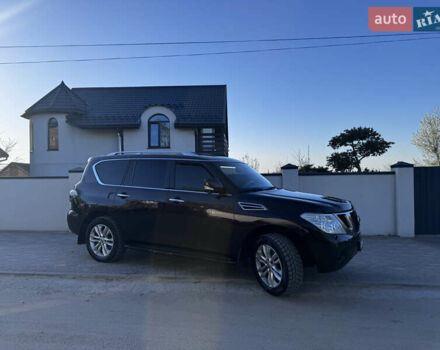 Червоний Ніссан Патрол, об'ємом двигуна 5.55 л та пробігом 180 тис. км за 20000 $, фото 1 на Automoto.ua