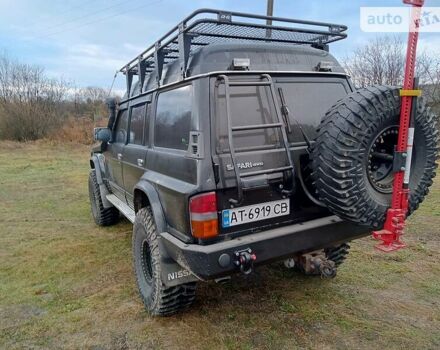 Сірий Ніссан Патрол, об'ємом двигуна 4.2 л та пробігом 10 тис. км за 15000 $, фото 8 на Automoto.ua