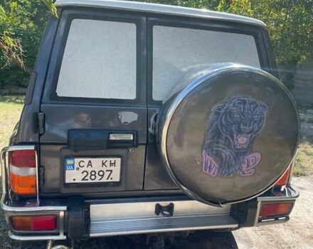 Серый Ниссан Патрол, объемом двигателя 2.8 л и пробегом 221 тыс. км за 14000 $, фото 6 на Automoto.ua