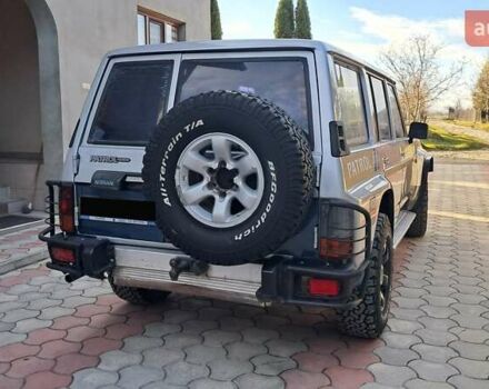 Серый Ниссан Патрол, объемом двигателя 2.8 л и пробегом 300 тыс. км за 9997 $, фото 26 на Automoto.ua