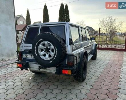Серый Ниссан Патрол, объемом двигателя 2.8 л и пробегом 234 тыс. км за 9300 $, фото 2 на Automoto.ua