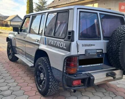 Серый Ниссан Патрол, объемом двигателя 2.8 л и пробегом 300 тыс. км за 9997 $, фото 22 на Automoto.ua
