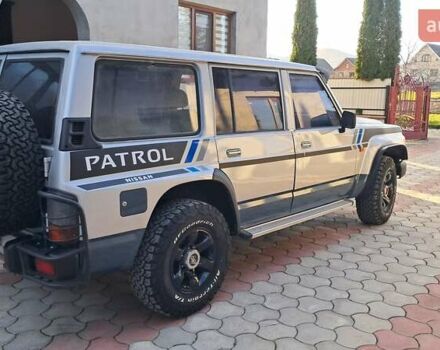 Серый Ниссан Патрол, объемом двигателя 2.8 л и пробегом 300 тыс. км за 9997 $, фото 6 на Automoto.ua