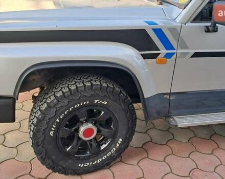 Серый Ниссан Патрол, объемом двигателя 2.8 л и пробегом 300 тыс. км за 9997 $, фото 17 на Automoto.ua