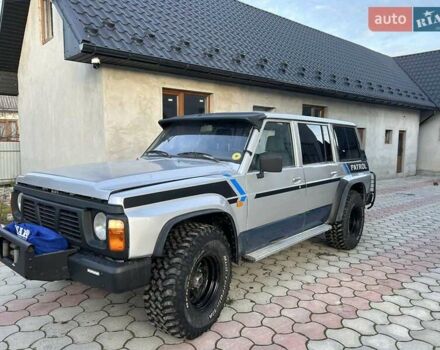 Серый Ниссан Патрол, объемом двигателя 2.8 л и пробегом 234 тыс. км за 9300 $, фото 13 на Automoto.ua