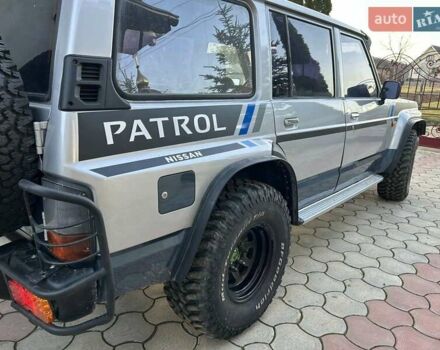 Серый Ниссан Патрол, объемом двигателя 2.8 л и пробегом 234 тыс. км за 9300 $, фото 6 на Automoto.ua
