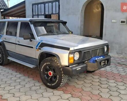 Серый Ниссан Патрол, объемом двигателя 2.8 л и пробегом 300 тыс. км за 9997 $, фото 5 на Automoto.ua