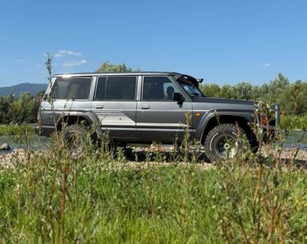 Серый Ниссан Патрол, объемом двигателя 2.8 л и пробегом 170 тыс. км за 10900 $, фото 7 на Automoto.ua