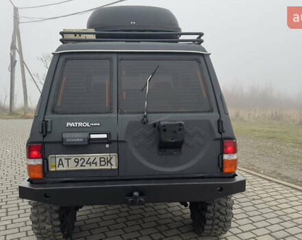 Серый Ниссан Патрол, объемом двигателя 2.8 л и пробегом 270 тыс. км за 16500 $, фото 13 на Automoto.ua