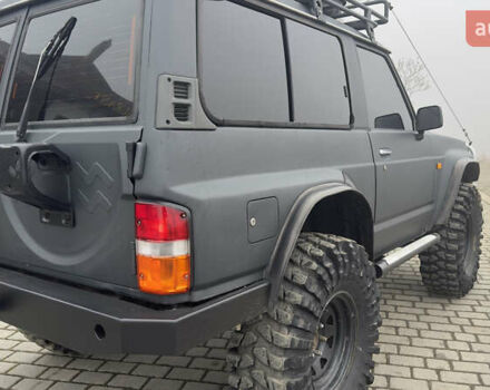Серый Ниссан Патрол, объемом двигателя 2.8 л и пробегом 270 тыс. км за 16500 $, фото 11 на Automoto.ua