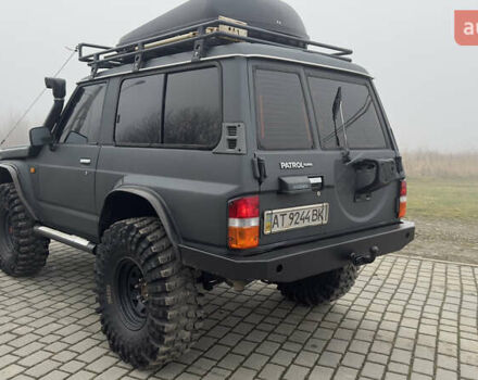 Серый Ниссан Патрол, объемом двигателя 2.8 л и пробегом 270 тыс. км за 16500 $, фото 14 на Automoto.ua