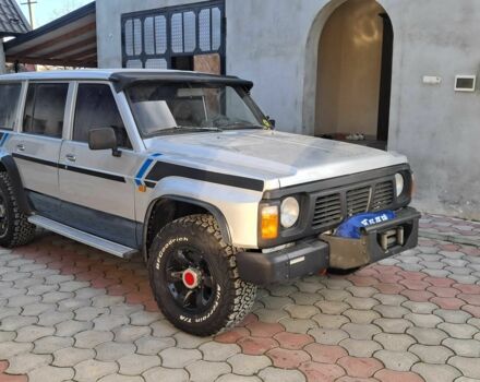 Серый Ниссан Патрол, объемом двигателя 2.8 л и пробегом 234 тыс. км за 9999 $, фото 4 на Automoto.ua