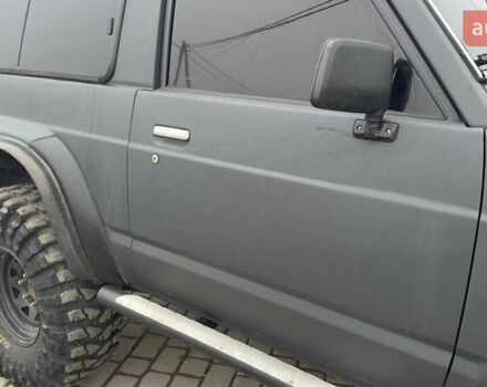 Серый Ниссан Патрол, объемом двигателя 2.8 л и пробегом 270 тыс. км за 16500 $, фото 7 на Automoto.ua
