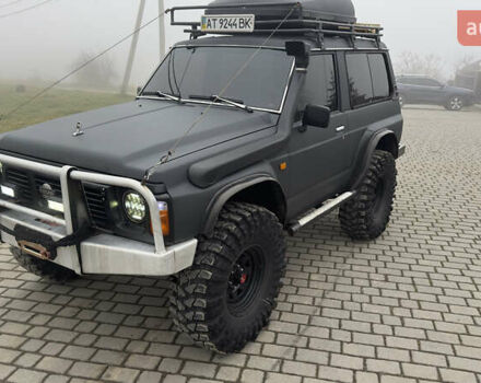 Серый Ниссан Патрол, объемом двигателя 2.8 л и пробегом 270 тыс. км за 16500 $, фото 2 на Automoto.ua