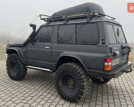 Серый Ниссан Патрол, объемом двигателя 2.8 л и пробегом 270 тыс. км за 16500 $, фото 17 на Automoto.ua