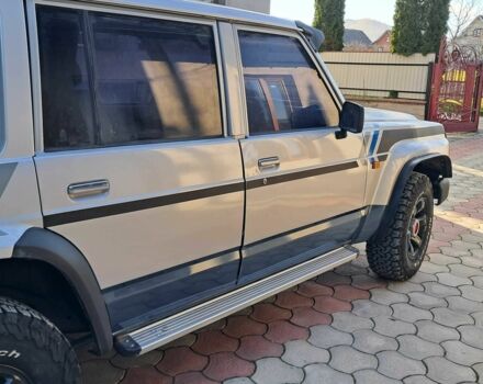 Серый Ниссан Патрол, объемом двигателя 2.8 л и пробегом 234 тыс. км за 9999 $, фото 7 на Automoto.ua