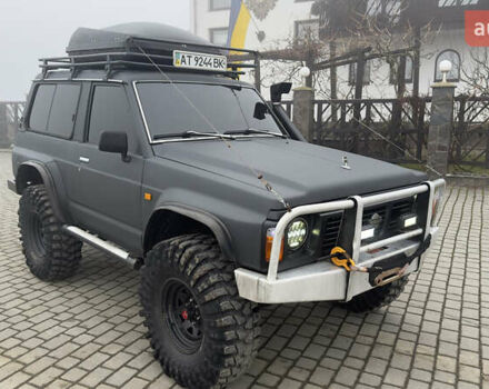 Серый Ниссан Патрол, объемом двигателя 2.8 л и пробегом 270 тыс. км за 16500 $, фото 6 на Automoto.ua