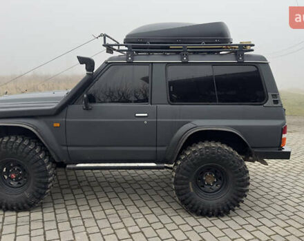 Серый Ниссан Патрол, объемом двигателя 2.8 л и пробегом 270 тыс. км за 16500 $, фото 19 на Automoto.ua