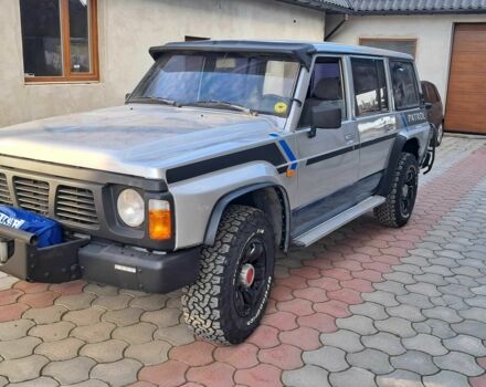 Серый Ниссан Патрол, объемом двигателя 2.8 л и пробегом 234 тыс. км за 9999 $, фото 2 на Automoto.ua