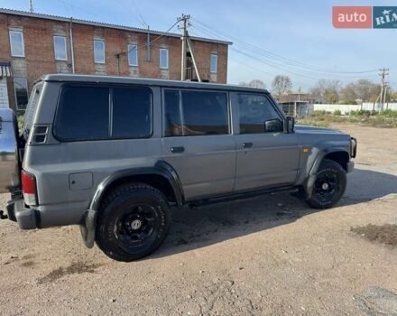 Сірий Ніссан Патрол, об'ємом двигуна 3 л та пробігом 296 тис. км за 12800 $, фото 2 на Automoto.ua