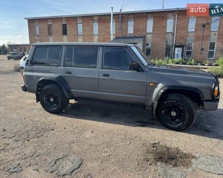 Сірий Ніссан Патрол, об'ємом двигуна 3 л та пробігом 296 тис. км за 12800 $, фото 1 на Automoto.ua