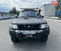 Серый Ниссан Патрол, объемом двигателя 3 л и пробегом 295 тыс. км за 17800 $, фото 3 на Automoto.ua