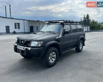 Серый Ниссан Патрол, объемом двигателя 3 л и пробегом 295 тыс. км за 17800 $, фото 9 на Automoto.ua
