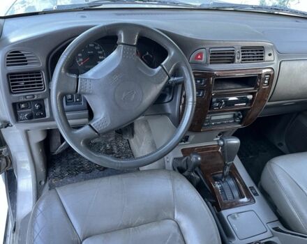 Серый Ниссан Патрол, объемом двигателя 3 л и пробегом 170 тыс. км за 8999 $, фото 5 на Automoto.ua