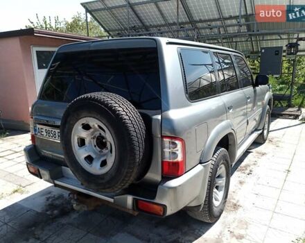 Серый Ниссан Патрол, объемом двигателя 2.95 л и пробегом 363 тыс. км за 16000 $, фото 3 на Automoto.ua