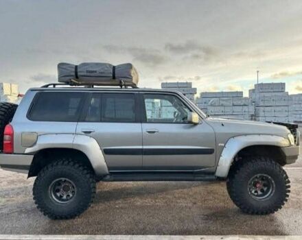 Сірий Ніссан Патрол, об'ємом двигуна 3 л та пробігом 244 тис. км за 3838 $, фото 4 на Automoto.ua