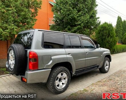 Серый Ниссан Патрол, объемом двигателя 3 л и пробегом 250 тыс. км за 20000 $, фото 3 на Automoto.ua