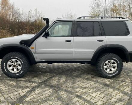 Серый Ниссан Патрол, объемом двигателя 3 л и пробегом 200 тыс. км за 4000 $, фото 3 на Automoto.ua