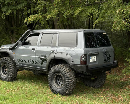 Серый Ниссан Патрол, объемом двигателя 2.5 л и пробегом 200 тыс. км за 66006 $, фото 3 на Automoto.ua