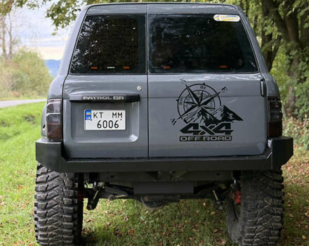 Серый Ниссан Патрол, объемом двигателя 2.5 л и пробегом 200 тыс. км за 66006 $, фото 4 на Automoto.ua