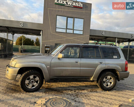 Серый Ниссан Патрол, объемом двигателя 2.95 л и пробегом 369 тыс. км за 19000 $, фото 6 на Automoto.ua
