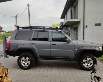 Серый Ниссан Патрол, объемом двигателя 3 л и пробегом 140 тыс. км за 19500 $, фото 1 на Automoto.ua