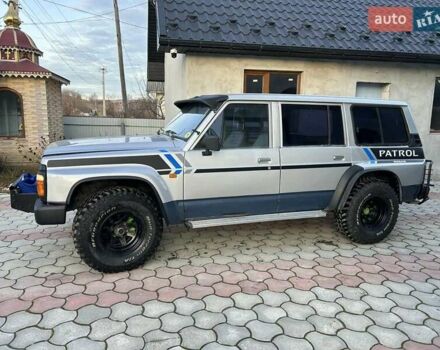 Серый Ниссан Патрол, объемом двигателя 2.8 л и пробегом 234 тыс. км за 9300 $, фото 1 на Automoto.ua