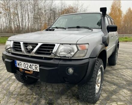 Серый Ниссан Патрол, объемом двигателя 3 л и пробегом 200 тыс. км за 4000 $, фото 1 на Automoto.ua