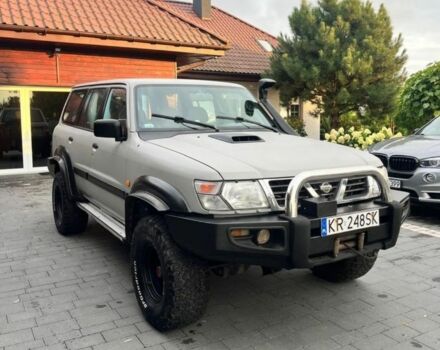 Серый Ниссан Патрол, объемом двигателя 3 л и пробегом 244 тыс. км за 4000 $, фото 1 на Automoto.ua