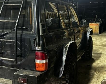 Синий Ниссан Патрол, объемом двигателя 2.8 л и пробегом 300 тыс. км за 6900 $, фото 12 на Automoto.ua