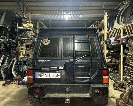 Синий Ниссан Патрол, объемом двигателя 2.8 л и пробегом 300 тыс. км за 6900 $, фото 3 на Automoto.ua