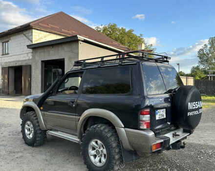 Синій Ніссан Патрол, об'ємом двигуна 2.83 л та пробігом 270 тис. км за 14900 $, фото 3 на Automoto.ua