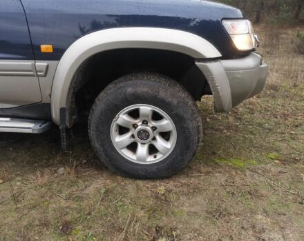 Синий Ниссан Патрол, объемом двигателя 3 л и пробегом 200 тыс. км за 8285 $, фото 2 на Automoto.ua