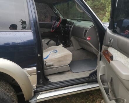 Синий Ниссан Патрол, объемом двигателя 3 л и пробегом 200 тыс. км за 8285 $, фото 6 на Automoto.ua