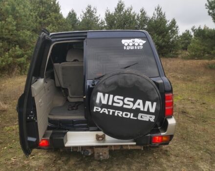 Синий Ниссан Патрол, объемом двигателя 3 л и пробегом 200 тыс. км за 8285 $, фото 4 на Automoto.ua