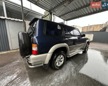 Синий Ниссан Патрол, объемом двигателя 3 л и пробегом 390 тыс. км за 12500 $, фото 6 на Automoto.ua