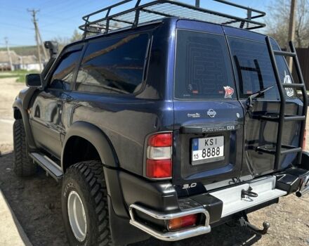 Синий Ниссан Патрол, объемом двигателя 3 л и пробегом 220 тыс. км за 16500 $, фото 3 на Automoto.ua